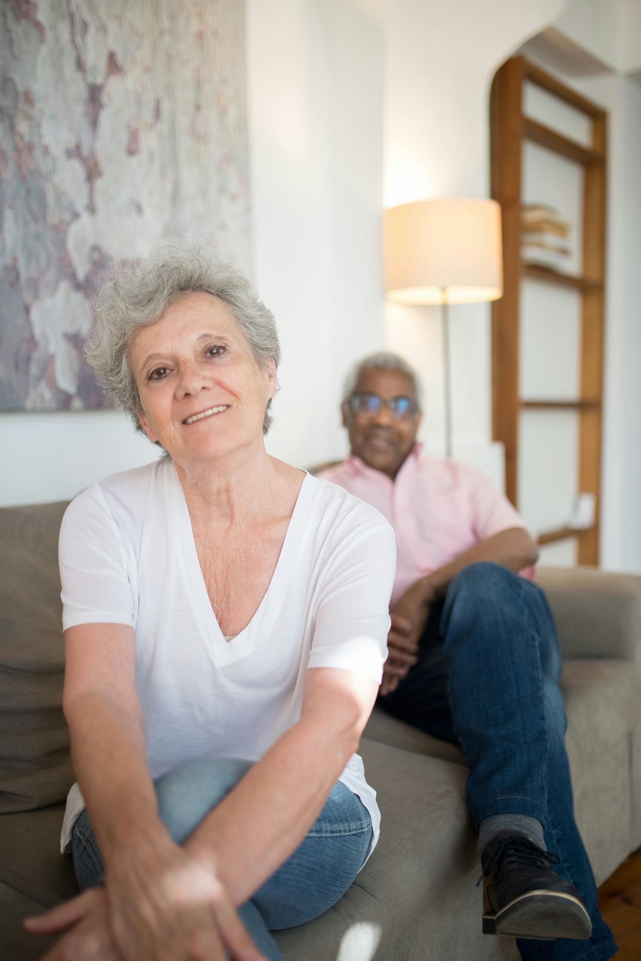A smiling older couple at home